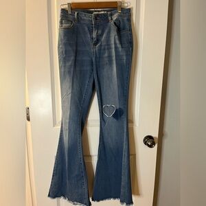 EST 1947 Denim bell bottoms stretchy jeans with heart patch. High waist
